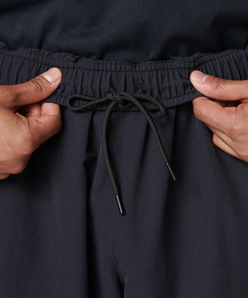 UNDER ARMOUR(アンダーアーマー)の「UAナイロン トラックパンツ(ライフスタイル/メンズ)(その他パンツ・メンズ・ブラック・XL/L/M/S/2XL)」の11枚目の写真