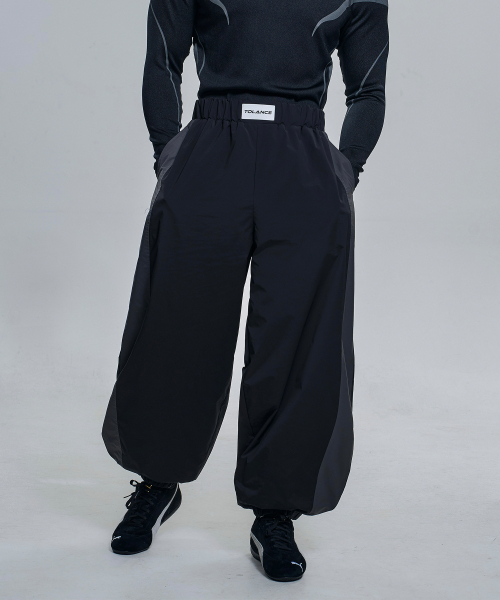 TOLANCE(トランス)の「エリートワイドカーブドジョガーパンツ - ブラック(スウェットパンツ・メンズ・ブラック・LARGE/MEDIUM/XX-LARGE/X-LARGE)」の2枚目の写真