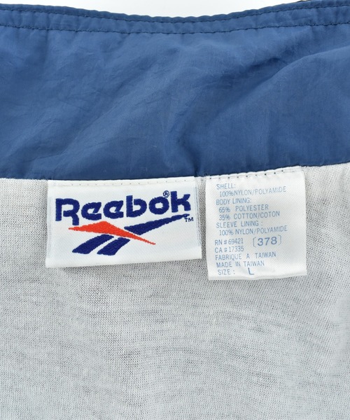 Reebok(リーボック)の「【USED】90’s Reebok ナイロン トラックジャケット(ナイロンジャケット・メンズ・ブルー・LARGE)」の4枚目の写真