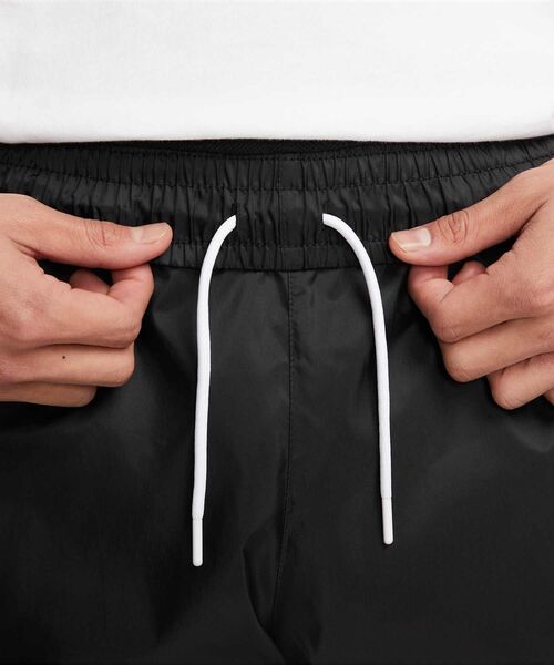 NIKE(ナイキ)の「ナイキ ウィンドランナー ウーブン パンツ / Nike Windrunner Men's Woven Lined Pants DX0654-011 Black(その他パンツ・メンズ・ブラック・L/2XL/M/S/XL)」の12枚目の写真