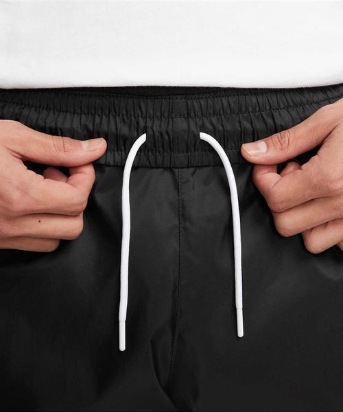 NIKE(ナイキ)の「ナイキ ウィンドランナー ウーブン パンツ / Nike Windrunner Men's Woven Lined Pants DX0654-011 Black(その他パンツ・メンズ・ブラック・L/2XL/M/S/XL)」の6枚目の写真