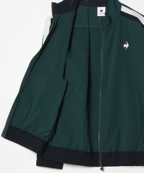le coq sportif（ルコックスポルティフ）の「フルジップクロスジャケット（ナイロンジャケット・レディース・グリーン/ブルー・L/M/XL/S）」の4枚目の写真