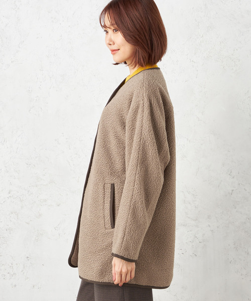 Petit Honfleur(プチオンフルール)の「ノーカラーボアコート(ムートンコート・レディース・アイボリー/モカ・L/M)」の3枚目の写真