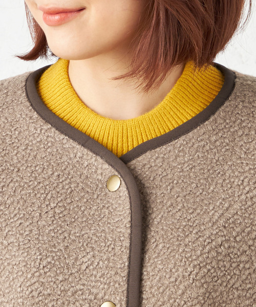 Petit Honfleur(プチオンフルール)の「ノーカラーボアコート(ムートンコート・レディース・アイボリー/モカ・L/M)」の12枚目の写真