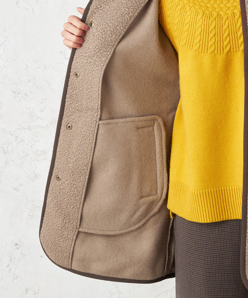 Petit Honfleur(プチオンフルール)の「ノーカラーボアコート(ムートンコート・レディース・アイボリー/モカ・L/M)」の7枚目の写真