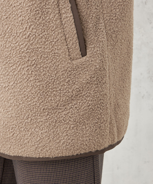 Petit Honfleur(プチオンフルール)の「ノーカラーボアコート(ムートンコート・レディース・アイボリー/モカ・L/M)」の11枚目の写真