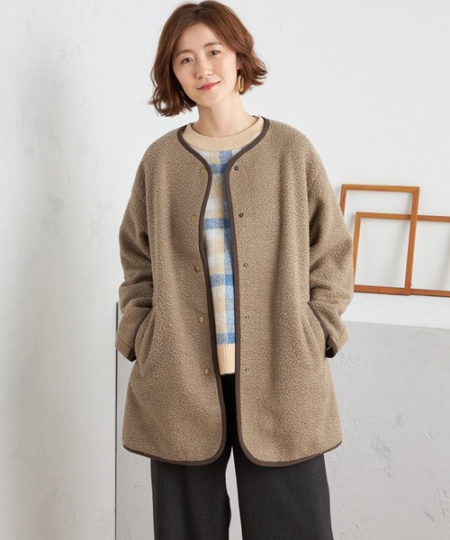 Petit Honfleur(プチオンフルール)の「ノーカラーボアコート(ムートンコート・レディース・アイボリー/モカ・L/M)」の13枚目の写真