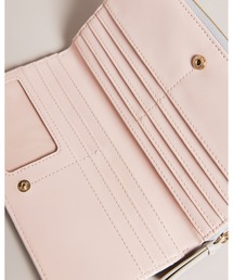 Ted Baker（テッドベーカー）の「DALIEA ブランドロゴ ラウンド