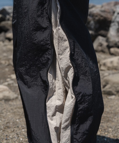 kutir（クティール）の「【低身長だからカッコよく着こなせるアイテム】バイカラージップナイロンパンツ(セットアップ着用可能)（その他パンツ・メンズ・ネイビー/アイボリー/ブラック・SMALL/MEDIUM）」の21枚目の写真