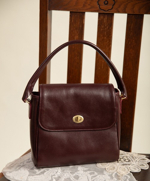 Dot&Stripes CHILD WOMAN(ドットアンドストライプス チャイルドウーマン)の「TIDEWAY別注 MOSS LEATHER ハンドBAG(ハンドバッグ・レディース・ダークブラウン/ブラック・FREE)」の2枚目の写真