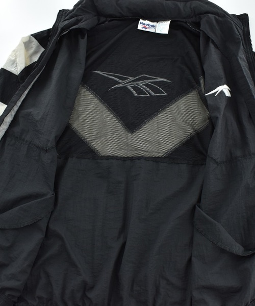 Reebok（リーボック）の「【USED】90’s Reebok ナイロン トラックジャケット（ナイロンジャケット・メンズ・ブラック・X-LARGE）」の4枚目の写真