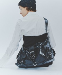 Carmelo（カーメロ）の「パテントレザーライク ミディアムショルダーバッグ / Le reve Boucle patent ring medium shoulder bag（ショルダーバッグ）」