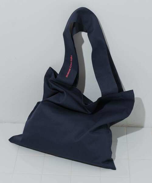 SMELLY(スメリー)の「ロゴシンプルワイドトート(トートバッグ・レディース・アイボリー/ブラック/ネイビー・-)」の3枚目の写真