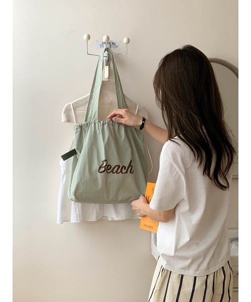 SALTMINT(ソルトミント)の「《韓国ファッション》Beach Color Drawstring Bag(ショルダーバッグ・レディース・オレンジ/イエロー/ベージュ/グレー/ライトブラウン/ブルー/グリーン/ピンク・ONE SIZE)」の12枚目の写真