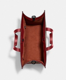 COACH（コーチ）の「ルーナー ニュー イヤー フィールド トート 40
