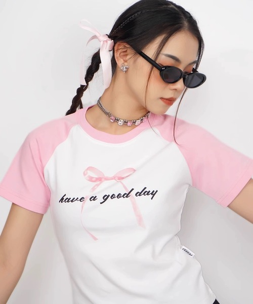 tシャツ A'GEM/9 × .kom 「CORYSTUDIO/コリースタジオ」リボンラグランカットソー レディース A'GEM/9 × .kom 『CORYSTUDIO/コリースタジオ』リボンラグラン