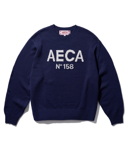 AECA(エイカ)の「AECA BIG LOGO WOOL KNIT-NAVY(ニット/セーター・レディース・その他・LARGE/MEDIUM/SMALL)」の1枚目の写真