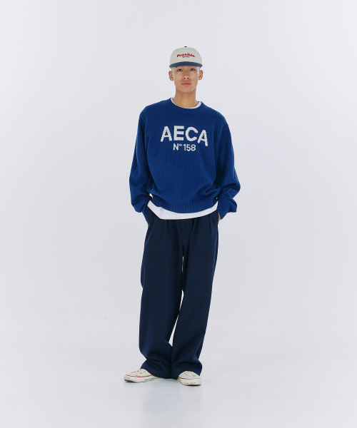 AECA(エイカ)の「AECA BIG LOGO WOOL KNIT-NAVY(ニット/セーター・レディース・その他・LARGE/MEDIUM/SMALL)」の7枚目の写真