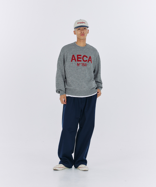 AECA(エイカ)の「AECA BIG LOGO WOOL KNIT-NAVY(ニット/セーター・レディース・その他・LARGE/MEDIUM/SMALL)」の4枚目の写真