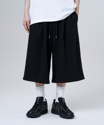 MOOVN（ムブン）の「バミューダワンタックロングスウェットパンツショートブラック（その他パンツ）」