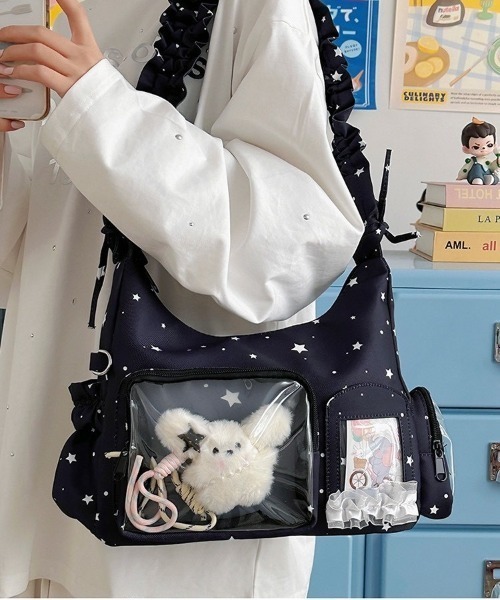 ipugo(イプゴ)の「ipugo/イプゴ フリル星柄 クリアポケット ショルダーバッグ 2026秋物 秋服 2026年秋冬(ショルダーバッグ・レディース・ホワイト/ブラック・FREE)」の1枚目の写真