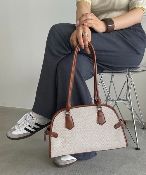 210nouve(トゥージュヌーブ)の「パイピング ミニ キャンバス ボストンバッグ(ボストンバッグ・レディース・キャメル/ブラック・FREE)」の1枚目の写真