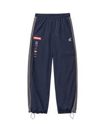 PHYPS MOTORCYCLE（フィップスモーターサイクル）の「Nylon Multi Logo Pants Navy（スウェットパンツ）」