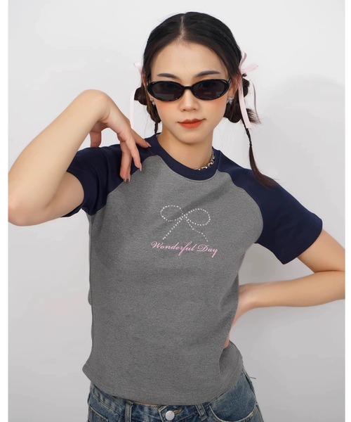 A'GEM9(エージェムナイン)の「A'GEM/9 × .kom 『CORYSTUDIO/コリースタジオ』リボンラグラン半袖カットソー(Tシャツ/カットソー・レディース・グレー・S/M)」の7枚目の写真