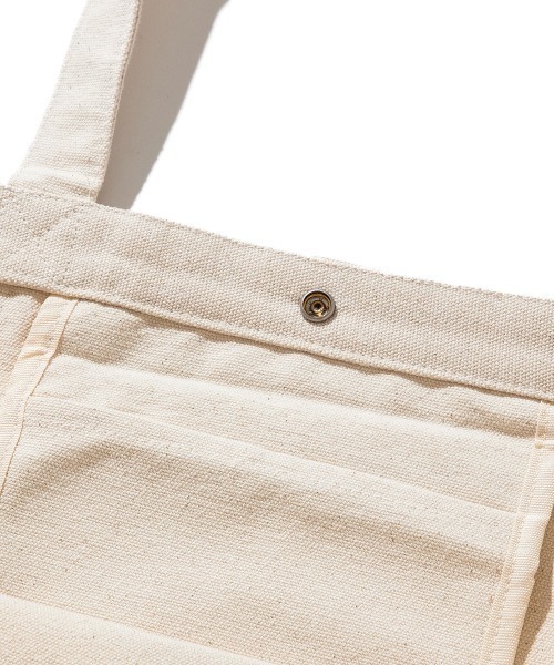 Kinetics(キネティクス)の「KINETICS 小山ゆうじろう×伊藤商店×Kinetics HESOMAGARI TOTE BAG LARGE(キネティクス へそまがり トートバッグ ラージ)(トートバッグ・メンズ・アイボリー・FREE)」の5枚目の写真