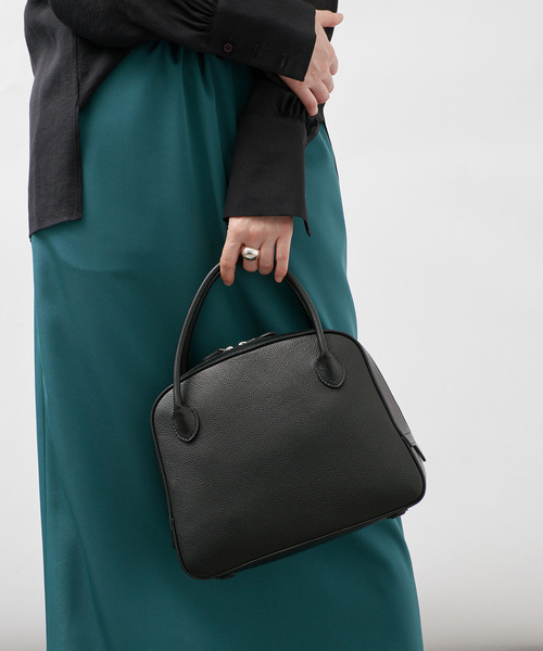 MAISON CANAU(メゾンカナウ)の「MAISON CANAU メゾン カナウ カラー別注 ラウンドボストン M 26FW2(ボストンバッグ・レディース・ブラック/ブラウン・FREE)」の1枚目の写真