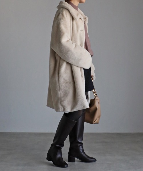 Yucca(ユッカ)の「エコファーステンカラーコート(ステンカラーコート・レディース・ブラック/クリーム・MEDIUM/LARGE)」の6枚目の写真