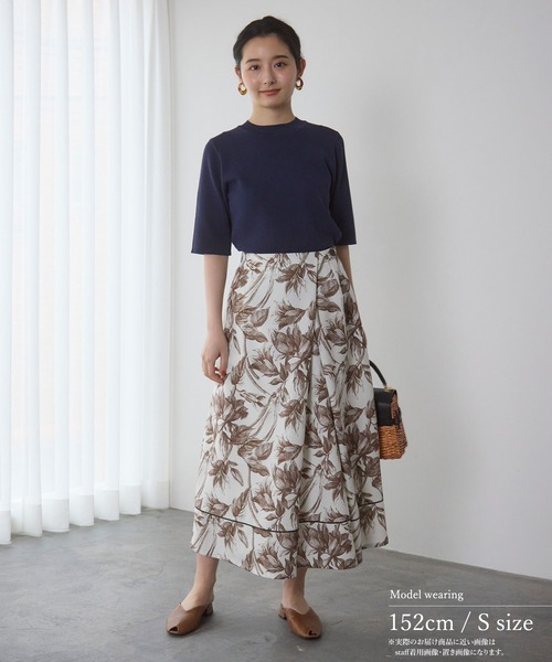 Sirin(シリン)の「フローラルパターンAラインタックスカート【2サイズ展開】(スカート・レディース・カーキ/オフホワイト・X-SMALL/SMALL)」の7枚目の写真