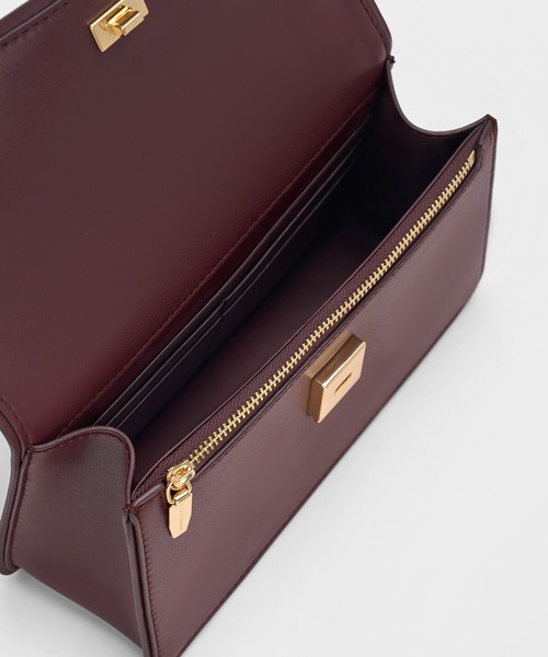 CHARLES & KEITH(チャールズ & キース)の「Arlet アラート ベルトトップハンドルバッグ(ハンドバッグ・レディース・ワインレッド/ブラック/クリーム・S)」の5枚目の写真