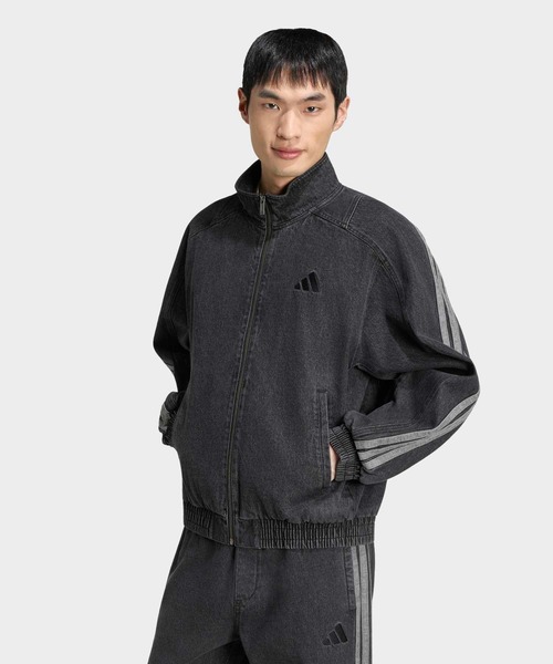 adidas(アディダス)の「スタジアム ルーズフィット デニム トラックジャケット / アディダス adidas(ジャージ・メンズ・ブラック・MEDIUM/X-LARGE/SMALL/X-SMALL/XX-LARGE/3XL/LARGE)」の1枚目の写真