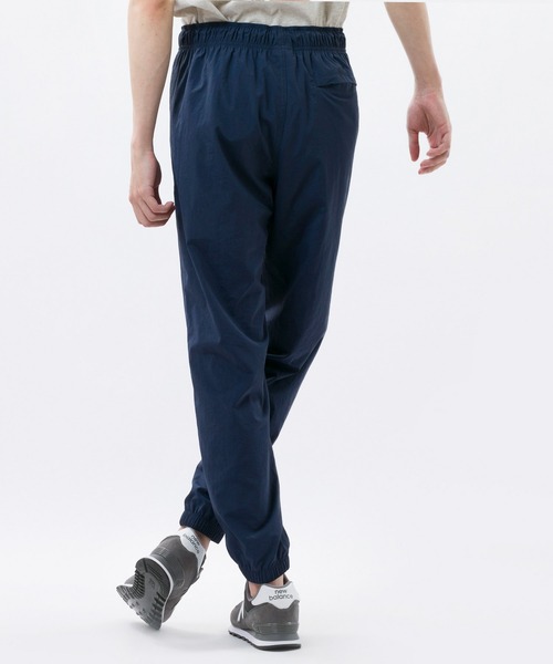 NEW BALANCE(ニューバランス)の「NB Athletics Higher Learning ウインドパンツ(その他パンツ・メンズ・ブラック/ネイビー/ブルー・SMALL/MEDIUM/LARGE/X-LARGE/XX-LARGE)」の7枚目の写真