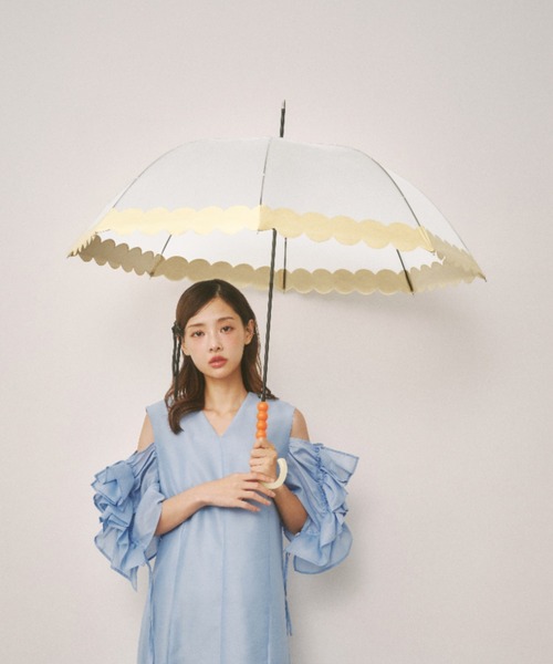 MILLION CARATS(ミリオンカラッツ)の「《because》透明なドーム型ボディに丸い “ぼんぼん” グリップが可愛らしいクリアアンブレラ(長傘・レディース・オフホワイト/グリーン/パープル・FREE)」の2枚目の写真