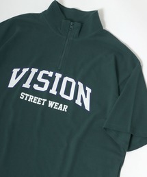 VISION STREET WEAR（ヴィジョンストリートウェア）の「VISION STREET WEAR/ヴィジョンストリートウェア ビッグシルエット カノコ カレッジロゴ ハーフジップ Tシャツ（Tシャツ/カットソー・メンズ）」