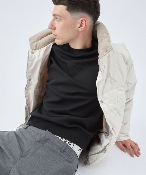 Calvin Klein（カルバン・クライン）の「【WEB限定】ユニセックス スタンドカラー ダウンジャケット（ダウンジャケット/コート・レディース・ブラック/その他/アイボリー/オレンジ・XL/M/S/L）」の22枚目の写真