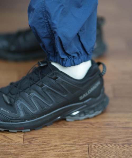 ムラサキスポーツ(ムラサキスポーツ)の「【ムラサキスポーツ限定】GRAMICCI×DEAR LAUREL ナイロントラックパンツ 水陸両用 撥水 セットアップ対応 GMP5-S2007(その他パンツ・メンズ・ブラック/ネイビー・M/L/XL)」の7枚目の写真