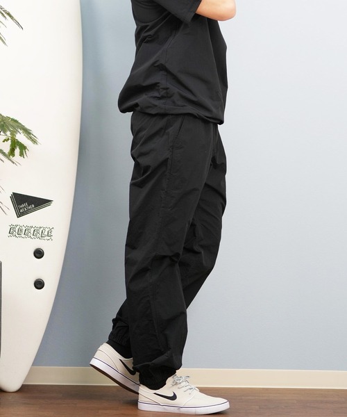 ムラサキスポーツ(ムラサキスポーツ)の「【ムラサキスポーツ限定】GRAMICCI×DEAR LAUREL ナイロントラックパンツ 水陸両用 撥水 セットアップ対応 GMP5-S2007(その他パンツ・メンズ・ブラック/ネイビー・M/L/XL)」の13枚目の写真