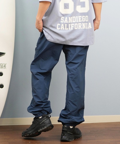 ムラサキスポーツ(ムラサキスポーツ)の「【ムラサキスポーツ限定】GRAMICCI×DEAR LAUREL ナイロントラックパンツ 水陸両用 撥水 セットアップ対応 GMP5-S2007(その他パンツ・メンズ・ブラック/ネイビー・M/L/XL)」の19枚目の写真