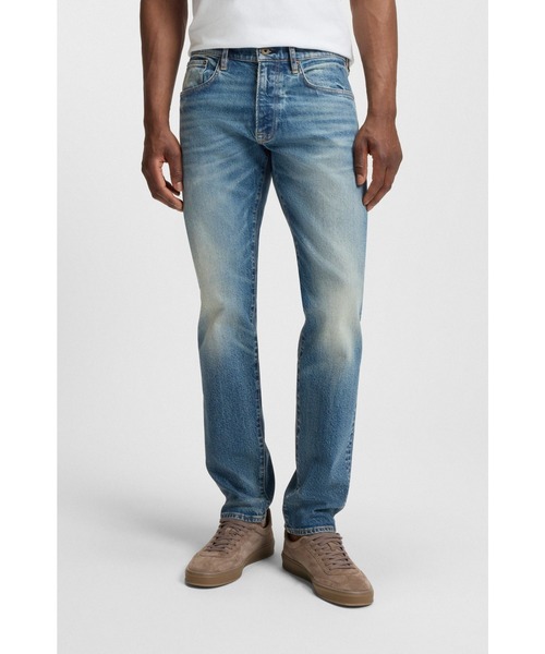BOSS(ボス)の「BECKHAM x BOSS スリムフィットジーンズ ビンテージウォッシュデニム(デニムパンツ・メンズ・ブルー・31/32/34/32/36/32/33/32/30/32/38/34)」の1枚目の写真