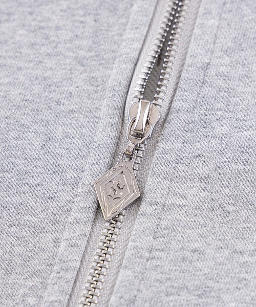 A'GEM/9 × .kom 『SUPPLIER/サプライヤー』 Pierced Tribal Cross Zip