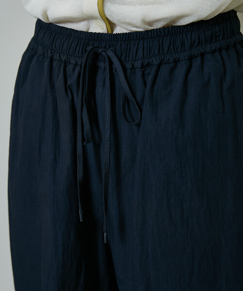 PUBLUX(パブリュクス)の「PUBLUX/パブリュクス 2WAY 巻きスカート 付き ナイロンパンツ 限定展開(その他パンツ・レディース・ブラウン/ネイビー/ベージュ・フリ-)」の6枚目の写真