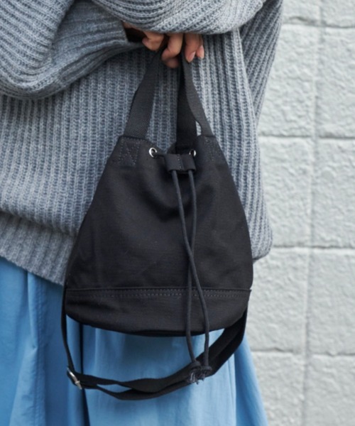 Auntie Rosa Holiday(アンティローザホリデー)の「キャンバスキンチャクバッグ(ショルダーバッグ・レディース・アイボリー/ブラック・FREE)」の2枚目の写真