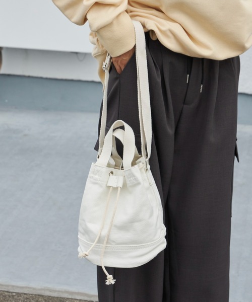 Auntie Rosa Holiday(アンティローザホリデー)の「キャンバスキンチャクバッグ(ショルダーバッグ・レディース・アイボリー/ブラック・FREE)」の16枚目の写真