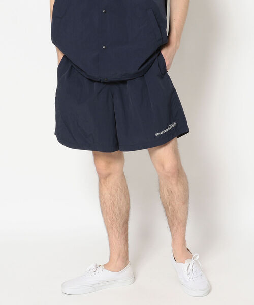 MANASTASH(マナスタッシュ)の「MANASTASH/マナスタッシュ SHELTECH LOGO SHORTS シェルテックロゴショーツ(その他パンツ・メンズ・ブラック/ネイビー・MEDIUM/LARGE/X-LARGE)」の1枚目の写真