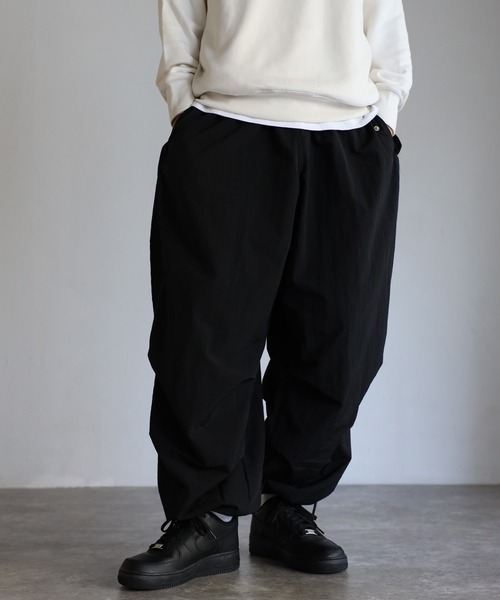 CREARE -LINO-（クレアーレリノ）の「ナイロン ワッシャースノー ルーズパンツ<ユニセックス>（その他パンツ・メンズ・ブラック/ネイビー/グリーン/マスタード/ホワイト・M/L/XL）」の3枚目の写真