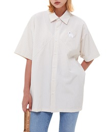 メンズのポロシャツ（ベージュ系・ストライプ柄）ファッション