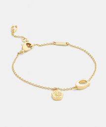 COACH（コーチ）の「エナメル シグネチャー ティーローズ チャーム リニア ブレスレット（ブレスレット）」